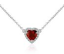 A January birthstone pendant necklace showcasing a heart-shaped garnet gemstone surrounded by diamonds set in white gold and white gold chain